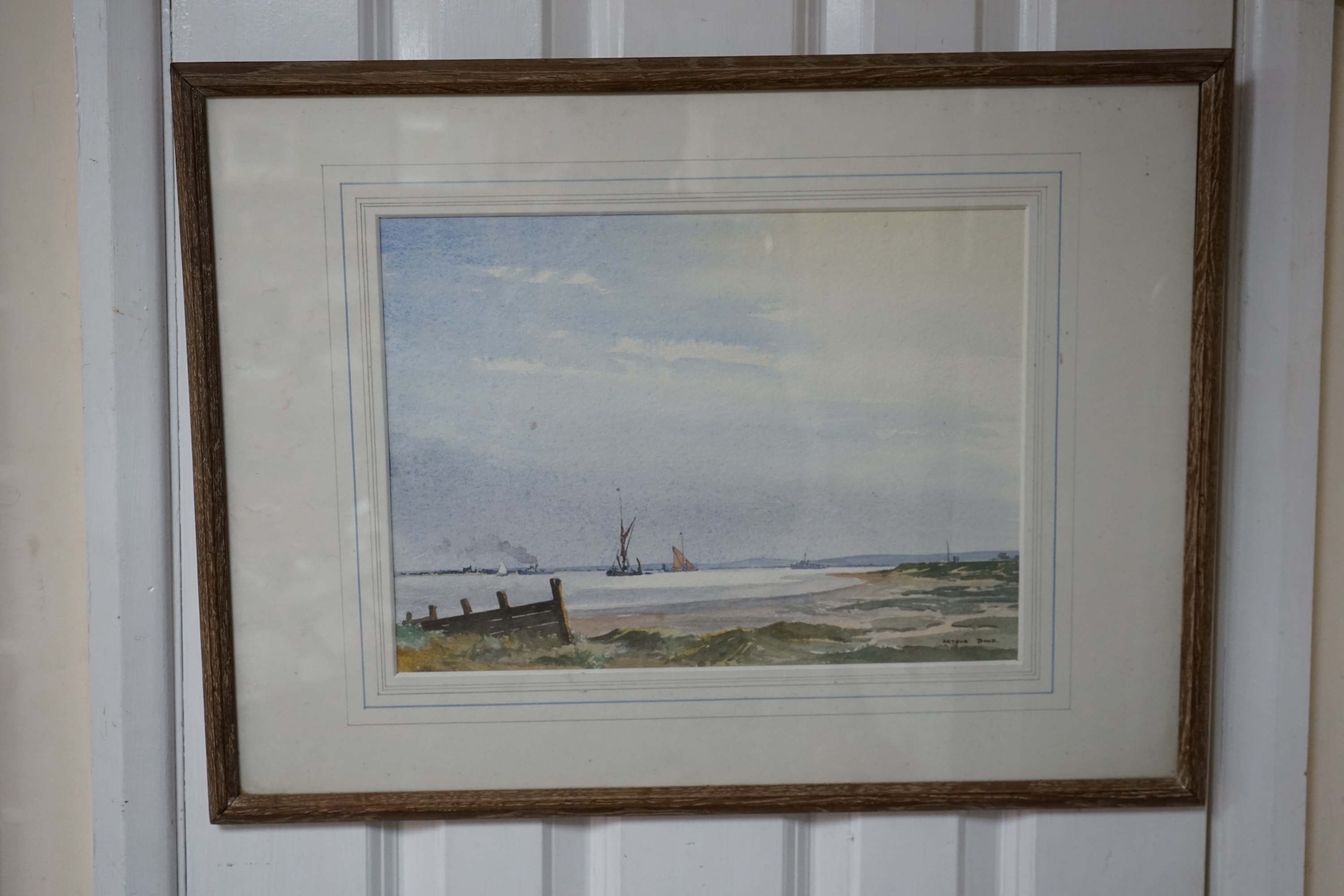 Arthur Bond (1888-1958), watercolour, Estuary scene, Wapping group artist's label verso, 25 x 35cm. Condition - fair, some minor spots of foxing